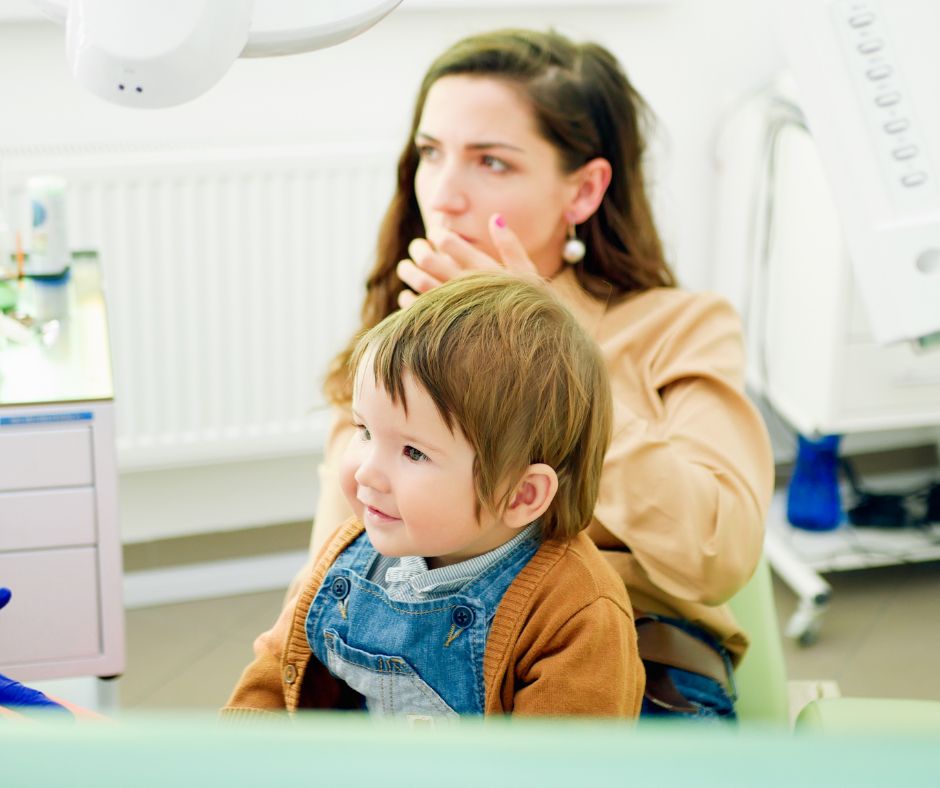 Knee-To-Knee Pediatric Dental Exam